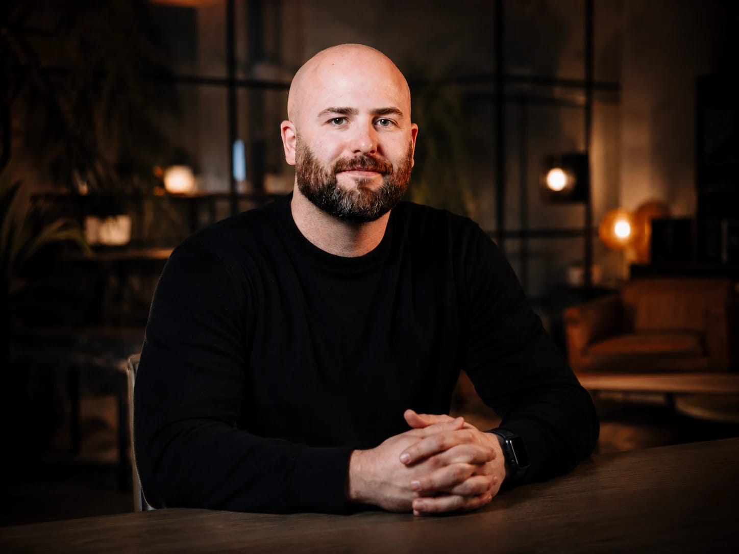 Jack Willoughby at a boardroom table