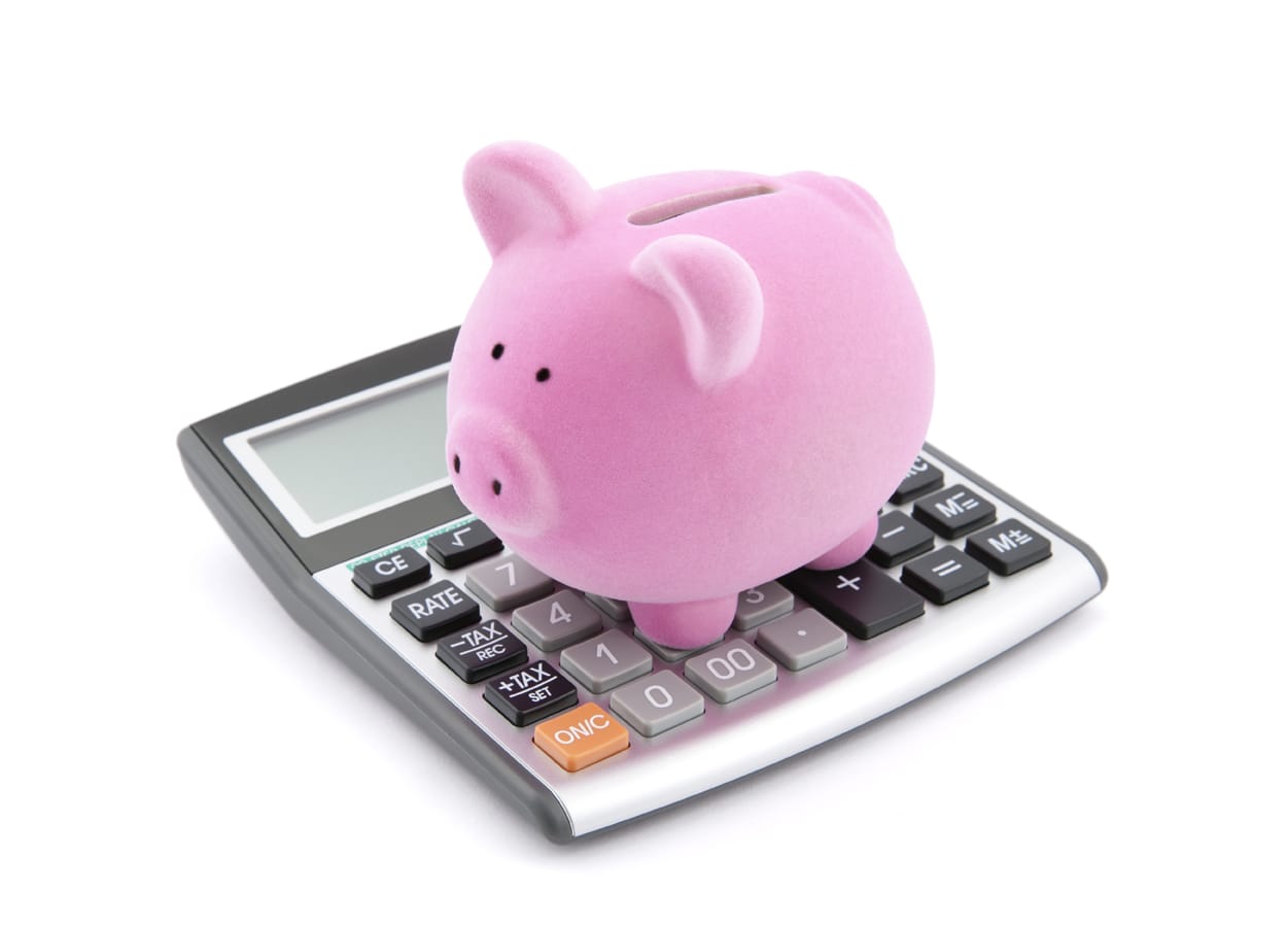 a piggy bank on a calculator