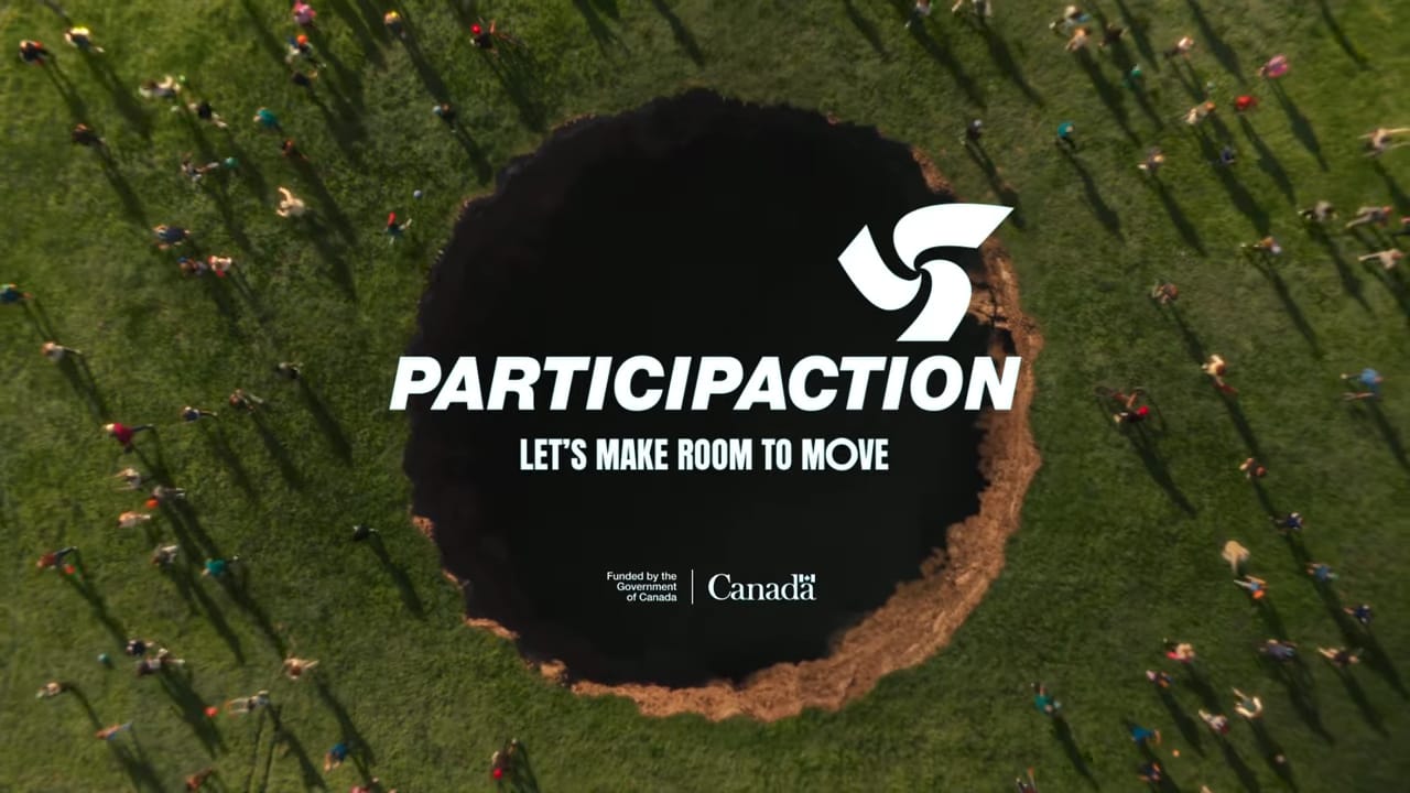 A circular pit with "Participaction" text above, surrounded by people on grass. Text reads: "LET'S MAKE ROOM TO MOVE. Funded by the Government of Canada.