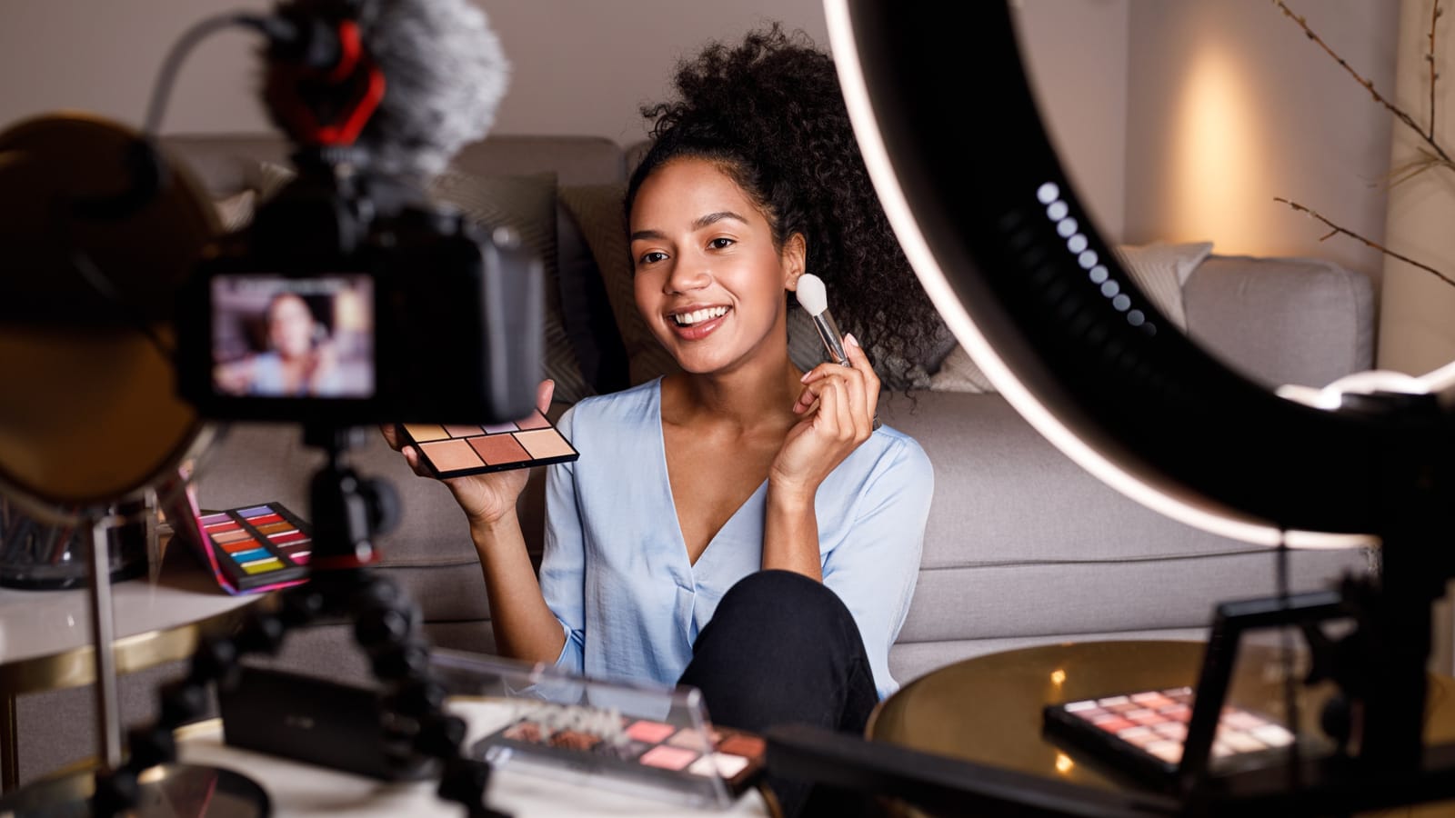 woman speaking into a camera